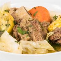 Soup · Beef soup and vegetables, served with rice and tortilla