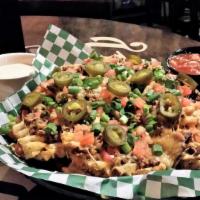 Irish Nachos · Waffle fries topped with seasoned beef or chicken, melted jack-cheddar cheese, tomatoes, jal...