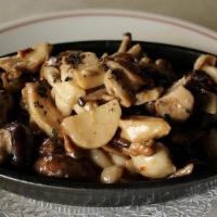 Mushrooms Marsala · fresh mushrooms sautéed with garlic and Marsala cream sauce