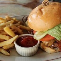 Daniel'S Prime Cheeseburger · custom-ground USDA Prime beef, Tillamook sharp cheddar, applewood smoked bacon, iceberg lett...