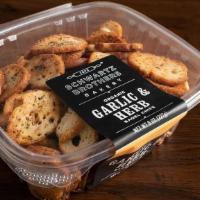 Bagel Chips - Garlic & Herb · Bagel Chips - Garlic & Herb.  Mixed in small batches and twice baked to achieve just the per...