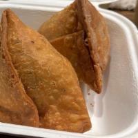 Vegetable Samosa · Mix vegetables stuffed, wrapped in flour pastry and deep fried.