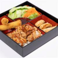 Bento Box · Served with vegetable roll (2 pcs), fried dumplings (3pcs), and garden salad.