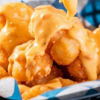 Smothered Pimento Queso Tots · 