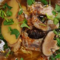 Duck Noodle · Yellow noodle soup with duck meat.
