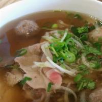 Phở Hải Dương Đặc Biệt · House special beef noodle soup - rare steak, well-done brisket, flank, fatty brisket, tendon...