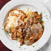 Chicken Valdostana · Chicken breast topped with prosciutto, mozzarella cheese, mushrooms and marsala sauce over s...