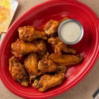 Mango Habanero Chicken Wings · 10 pieces of fresh-fried chicken wings, smothered and marinated in a delicious mango habaner...