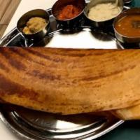 Masala Dosa · White lentil and rice crepe with Masala served with sambar and chutney