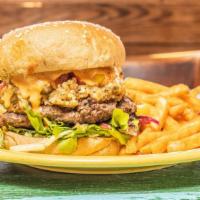 Boromir'S Boudin Burger · Beef topped with smoked jalapeño pork boudin, mango pico, spring mix, creole mustard, chipot...