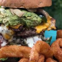 The Balrog Burger · Two beef patties, cheddar and jack cheese, bacon, avocado, sautéed mushrooms and jalapeños, ...