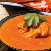 Tikka Masala (Gf) · Mouthwatering creamy tomato curry infused with fresh herbs and ground spices. Served with ba...