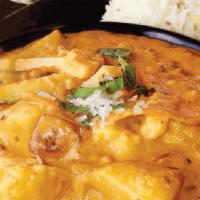 Coconut Curry (V) (Gf) · Smooth onion sauce infused with fresh ginger and garlic, finished with coconut milk & potato...