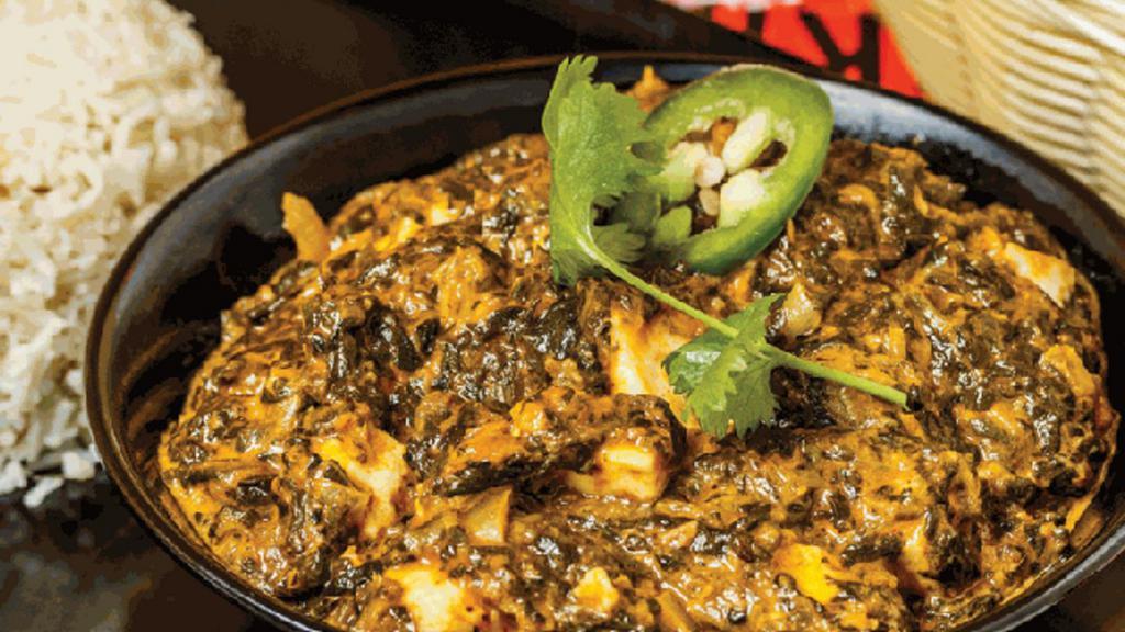 Saag (Gf) · Pureed spinach sauteed with garlic and onions, delicately spiced and enriched with cream. Served with basmati rice.