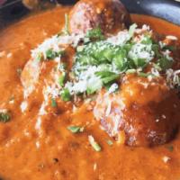Malai Kofta (N) · Savory vegetable dumplings cooked in a rich tomato-onion curry sauce. Served with basmati ri...