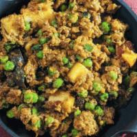 Beyond Keema Curry (V) · Plant-based ground meat with green peas & red potatoes, seasoned with coriander, dried chili...