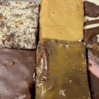 1 & 1/2 Lb Fudge Assortment Box · With our 1 and 1/2 lb fudge assortment box you can select up to 6 of our delicious fudge fla...