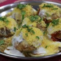 Dahi Batata Puri · Vegan. Mini crisped puris / potatoes / chickpeas / yogurt / onions / sev (crunchy chickpea n...