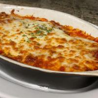 Baked Cheese Ravioli · Jumbo ravioli stuffed with ricotta cheese and topped with our house tomato sauce and mozzare...