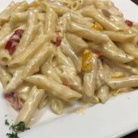 Chicken Alfredo · Sauteed chicken breast with red and yellow peppers, over penne pasta in alfredo sauce.