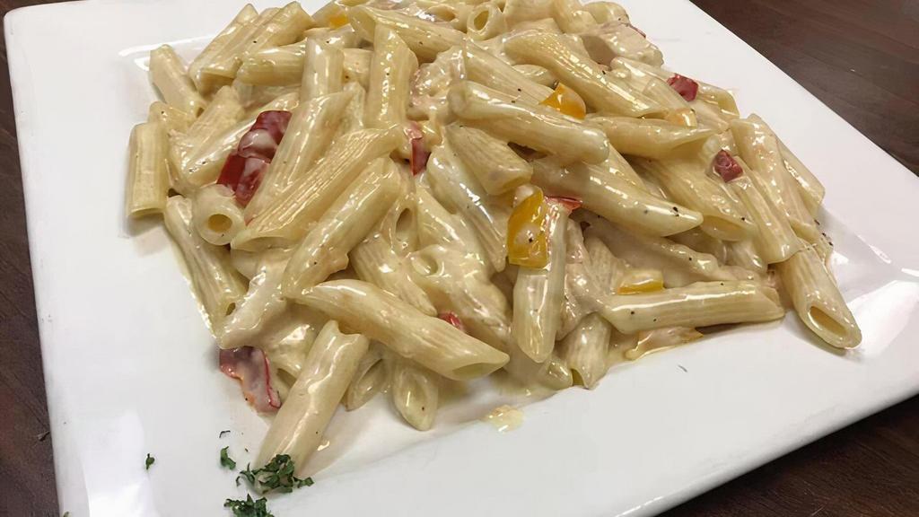 Chicken Alfredo · Sauteed chicken breast with red and yellow peppers, over penne pasta in alfredo sauce.