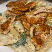 Blackened Chicken Primavera · Chicken breast seasoned and blackened with sauteed yellow squash, broccoli and mushrooms in ...