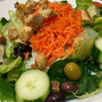 Garden Salad · Lettuce, tomatoes, olives, cucumbers, carrots, and croutons.