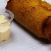 Corn Tamale · Tamale made with com served with cream