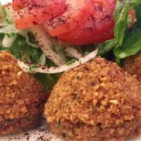 Falafel 8 Pieces · Made of chickpeas and vegetables, served with pita bread and tahini sauce.