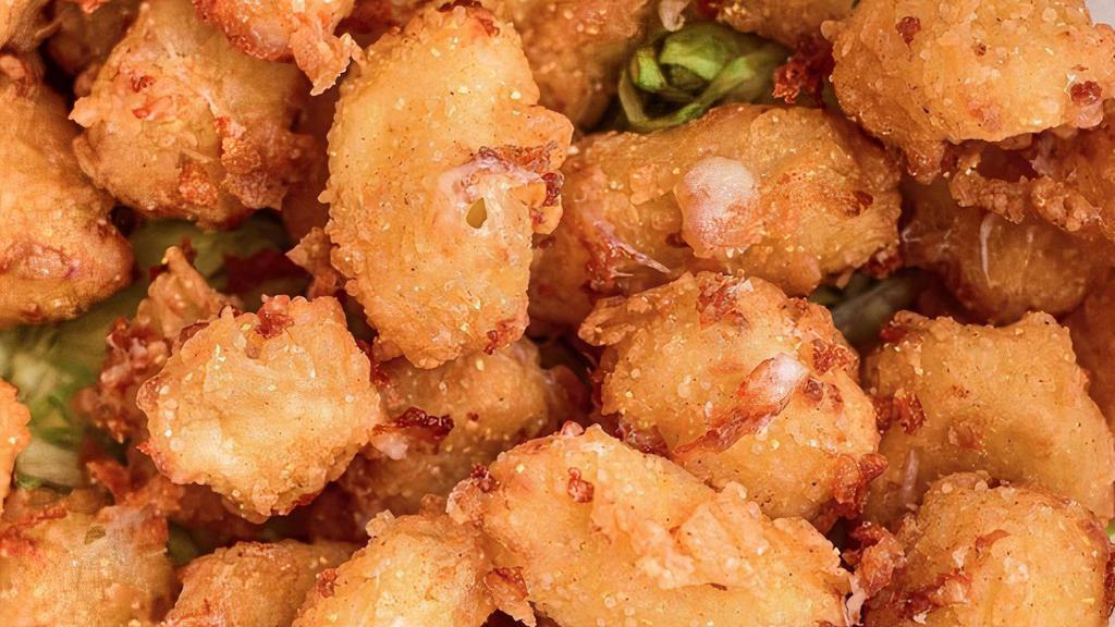 Wisconsin Fried Cheese Curds · Harp® beer-battered Wisconsin White Cheddar Cheese curds fried crisp and served with our buttermilk ranch dressing.