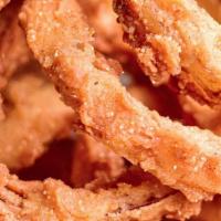 Onion Rings · Hand battered onion rings served with our handcrafted jalapeno mayo.