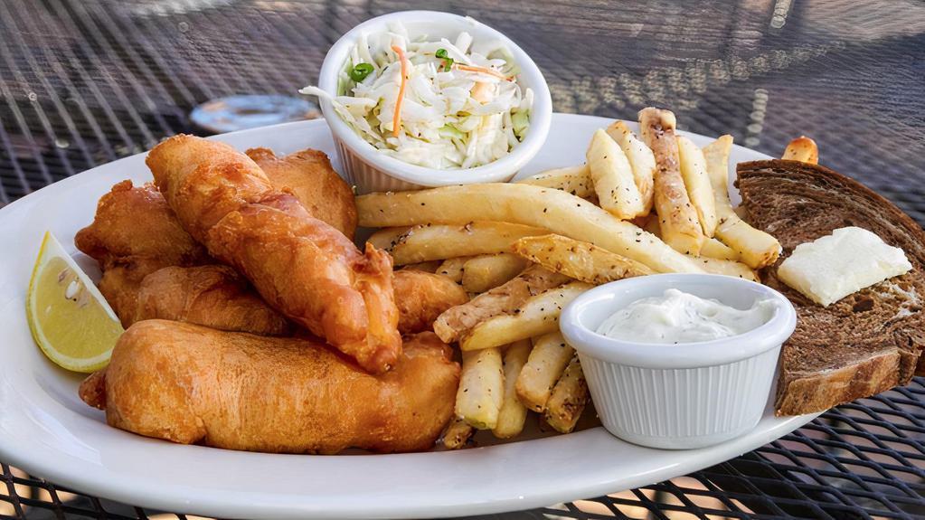 Fish & Chips · An Irish classic! Our delicious golden brown Harp® beer-battered Atlantic cod accompanied by our seasoned French fries and served with tangy tartar sauce and homemade slaw.