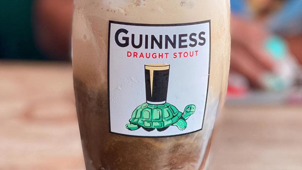 Guinness Float · Vanilla ice cream, Guinness, and chocolate syrup topped with whipped cream and cinnamon