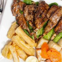 Lamb Chops · Five lamb chops served with choice of two sides.