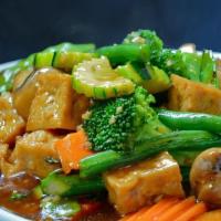 Pad Mixed Vegetables  · Stir fried mix vegetables & tofu in light garlic sauce.