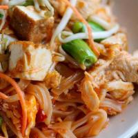 Pad Thai Jae · Stir fried rice noodles, bean sprouts, scallions, mix vegetables, tofu and crushed peanuts. ...