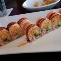 Spicy Lady · Spicy tuna, avocado, cucumber, shrimp tempura, wrapped in pink soy paper topped with spicy m...