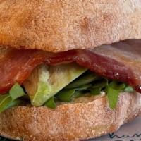 Bam Sandwich · Crispy bacon, avocado slices, house roasted garlic mayonnaise, arugula.