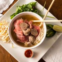 Rice Noodle Soup With Sirloin Steak And Meat Balls · 