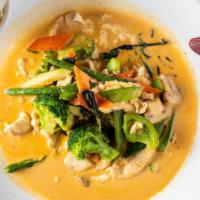 Curry Chicken · Spicy. Chicken stir-fried with green peppers, carrots and onions in curry spices.