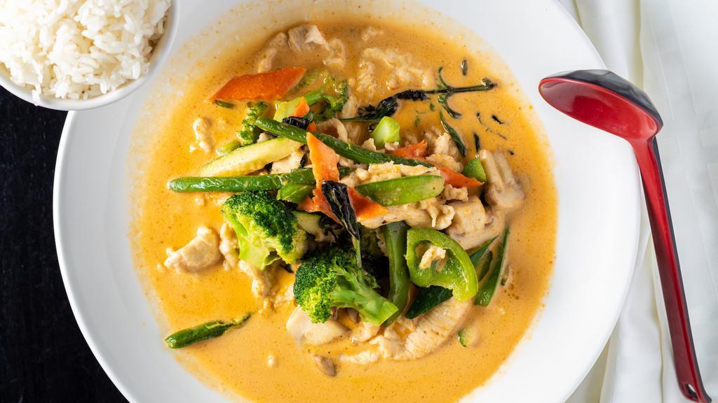 Curry Chicken · Chicken stir fried with green & red peppers, onions &  carrots in a curry sauce.