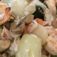Seafood War Bar · A delicious combination of shrimp, scallops and imitation crabmeat served with a variety of ...