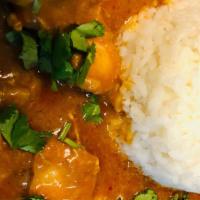 Chicken Curry · Delicious Boneless Chicken Cooked in Traditional Curry Sauce Served with Rice & Bread
