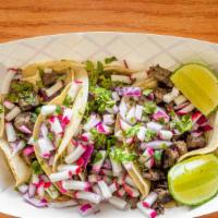 Steak Tacos (3) · 3 Steak Tacos Served with Salsa Guacamole, Special Tomato Sauce, Red Onion, Cilantro, and Re...