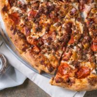 Meats Deluxe · Pepperoni, sausage, ham, bacon, ground beef. Meaty!