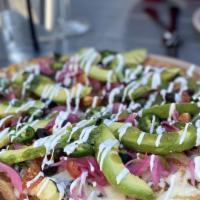 Mexican Pizza · Chicken or chorizo with beans,. cheese, avocado, sour cream, heirloom. tomato, olives, jalap...