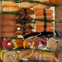Sashimi & Nigiri Platter · 30 pcs sashimi, 30 pcs nigiri.
