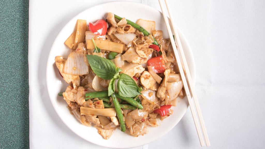 Pad Kee Mao (Drunken Noodle) · Hot. Wide flat rice noodle stir-fried with your choice of meat, onions, peppers, bamboo shoot, string bean, and basil with thai basil sauce.