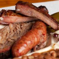 3 Meat Plate · Choose from our Slow Smoked Selection of Sliced Brisket, Chopped Beef, Pork Ribs, Sausage, o...