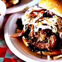Pulled Pork Sandwich · Pulled Pork with sweet bbq sauce, pickles, and onions...